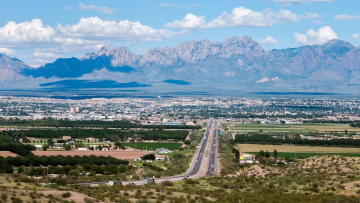 Las Cruces, New Mexico, and the distant Organ Mountains. Interstate 10 is shown entering the city on the west side.