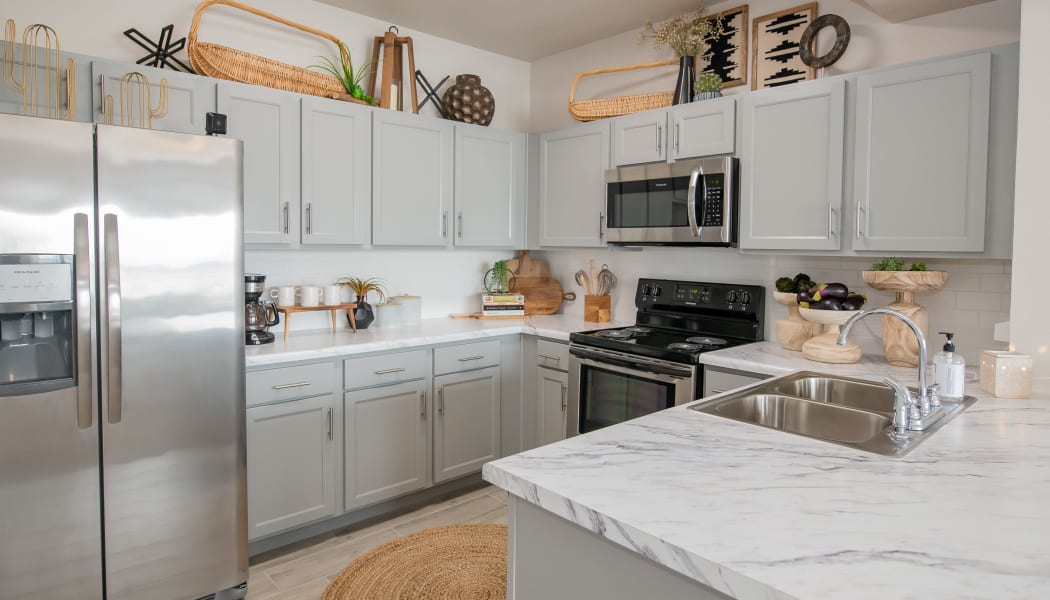 Kitchen with tons of natural light at Artisan Crossing in Norman, Oklahoma