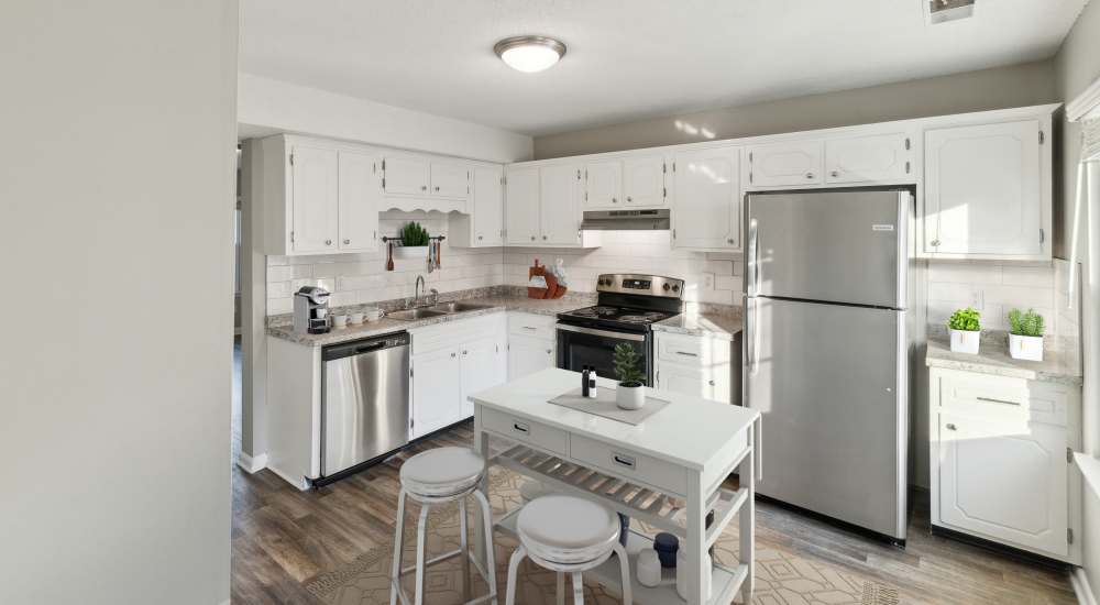 Kitchen with white cabinetries at Retreat at Concord in Clarksville, Tennessee