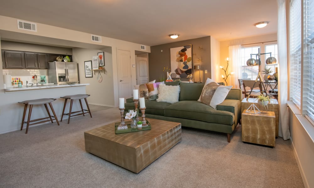Bright, spacious living room at Portico at Friars Creek Apartments in Temple, Texas