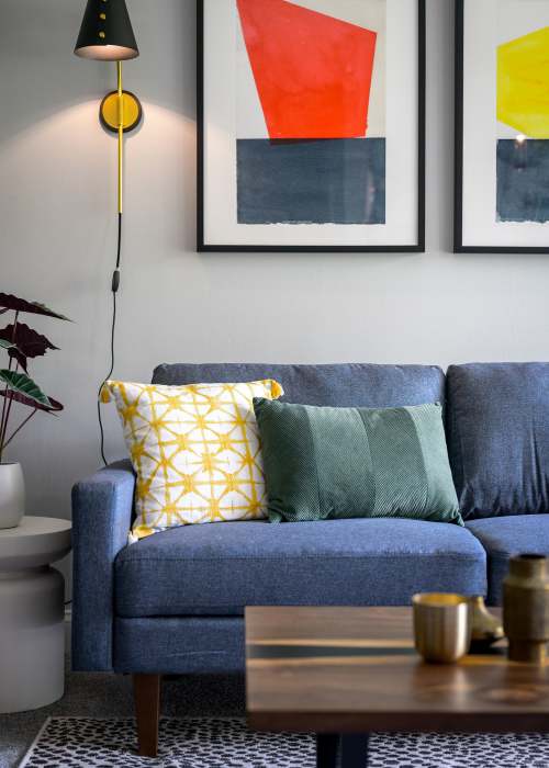 Living room with couch and coffee table at Beacon Hill Apartments in Alexandria, Virginia
