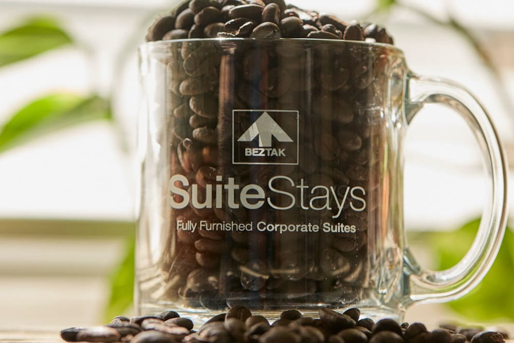 SuiteStays logo on a mug at Town Court in West Bloomfield, Michigan