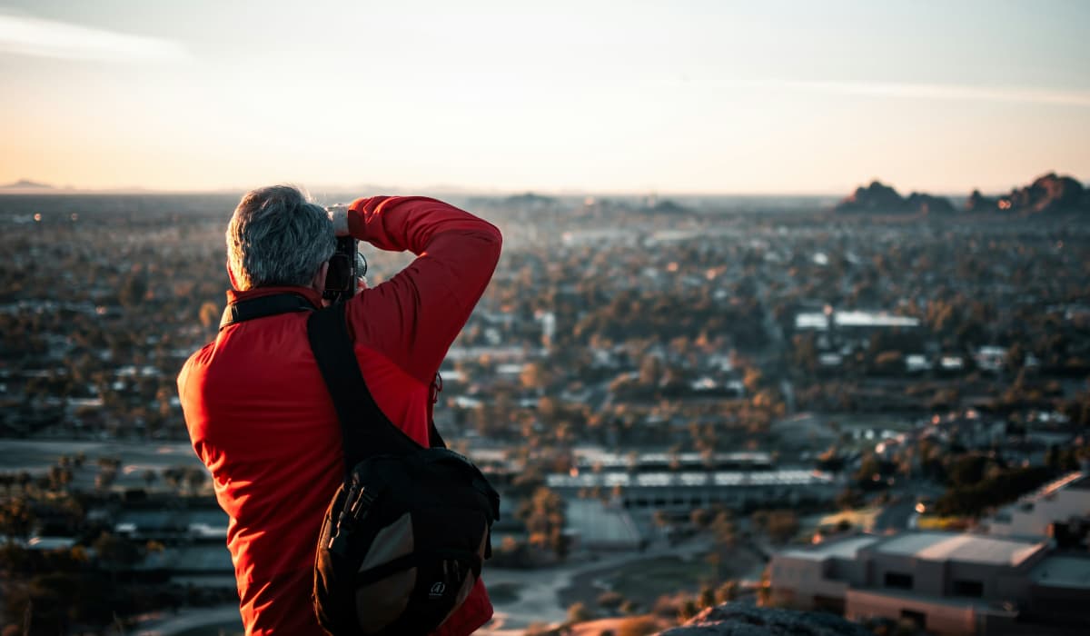 Resident clicking a picture of a neighborhood at Calista in Scottsdale, Arizona