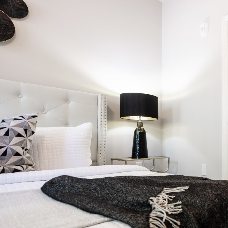 Model living space with black and white decor at Gilfield Park in Charlotte, North Carolina