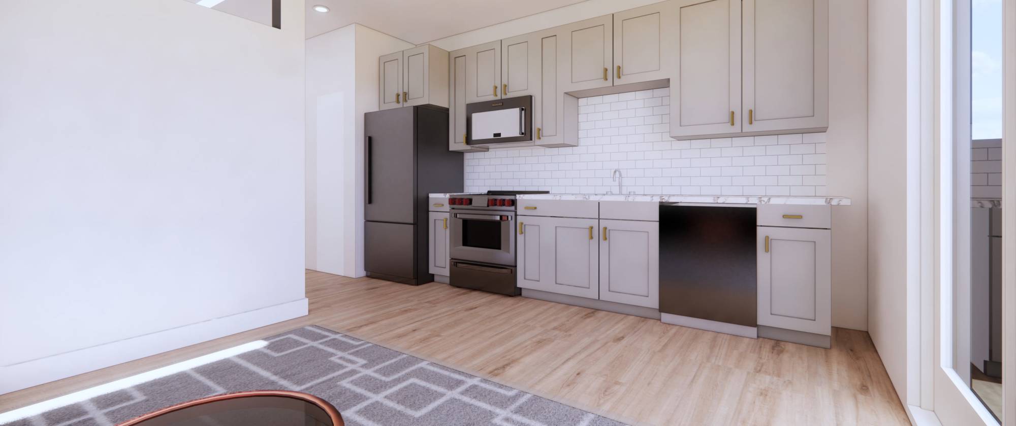Spacious kitchen with wood-style flooring at Factory 52 Apartments in Norwood, Ohio