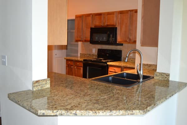 Fully equipped kitchen at Club at Stone Oak