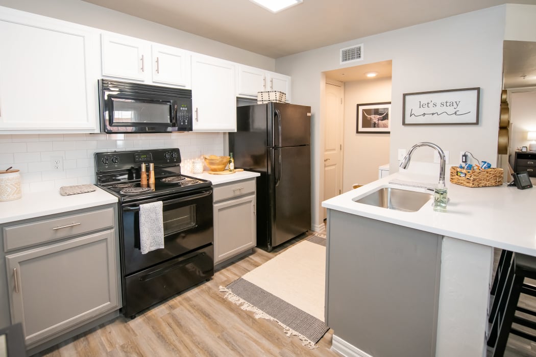 An apartment kitchen at Cross Timber in Oklahoma City, Oklahoma