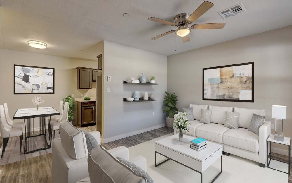 Living room with large sofa at Oak Place Apartments in Oklahoma City, Oklahoma