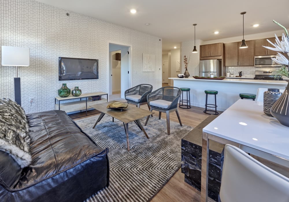 Expansive open-concept living area with a wood flooring in a model home at The Mills at Lehigh in Bethlehem, Pennsylvania