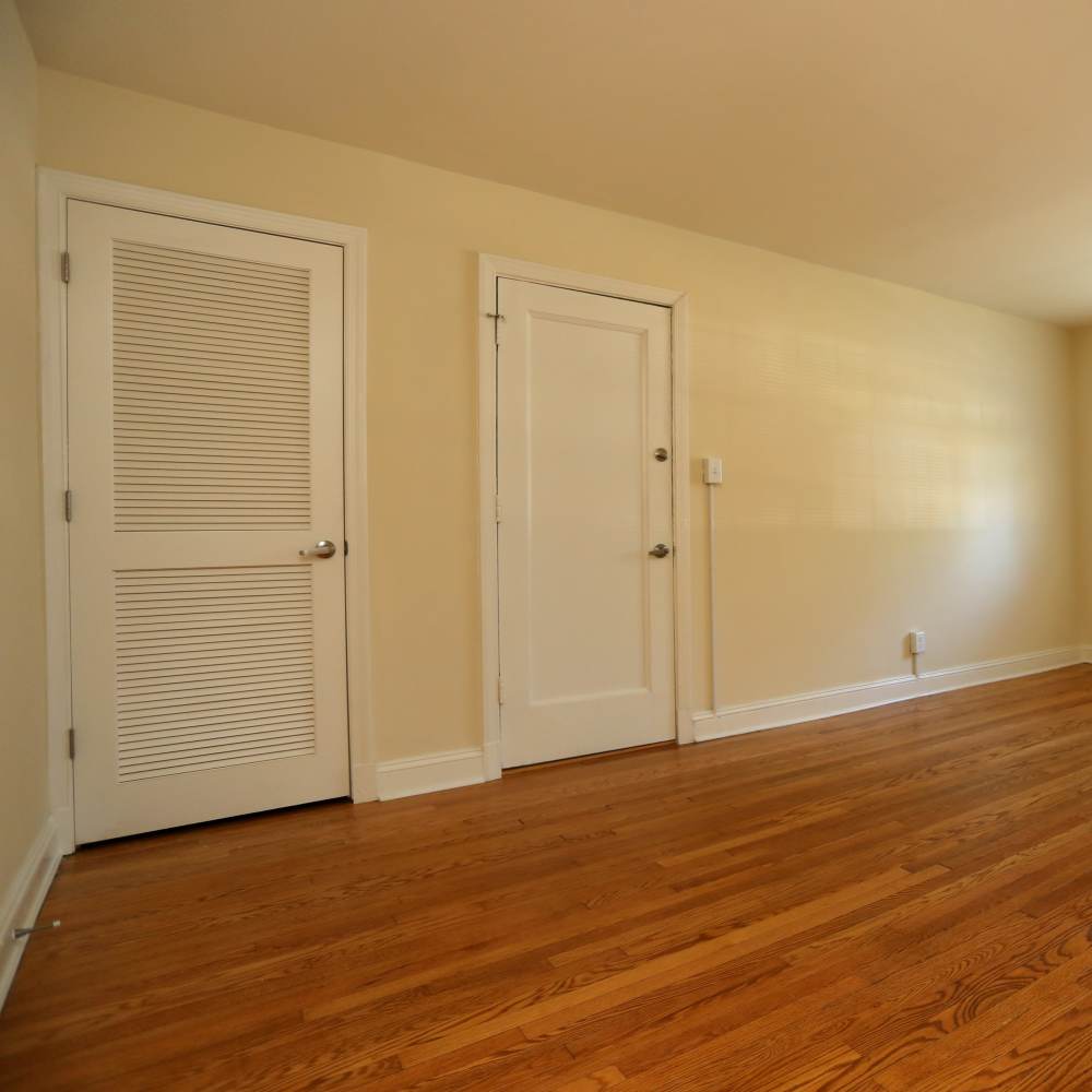 Living room with closet for storage  at Terraces at Bellevue in Richmond, Virginia