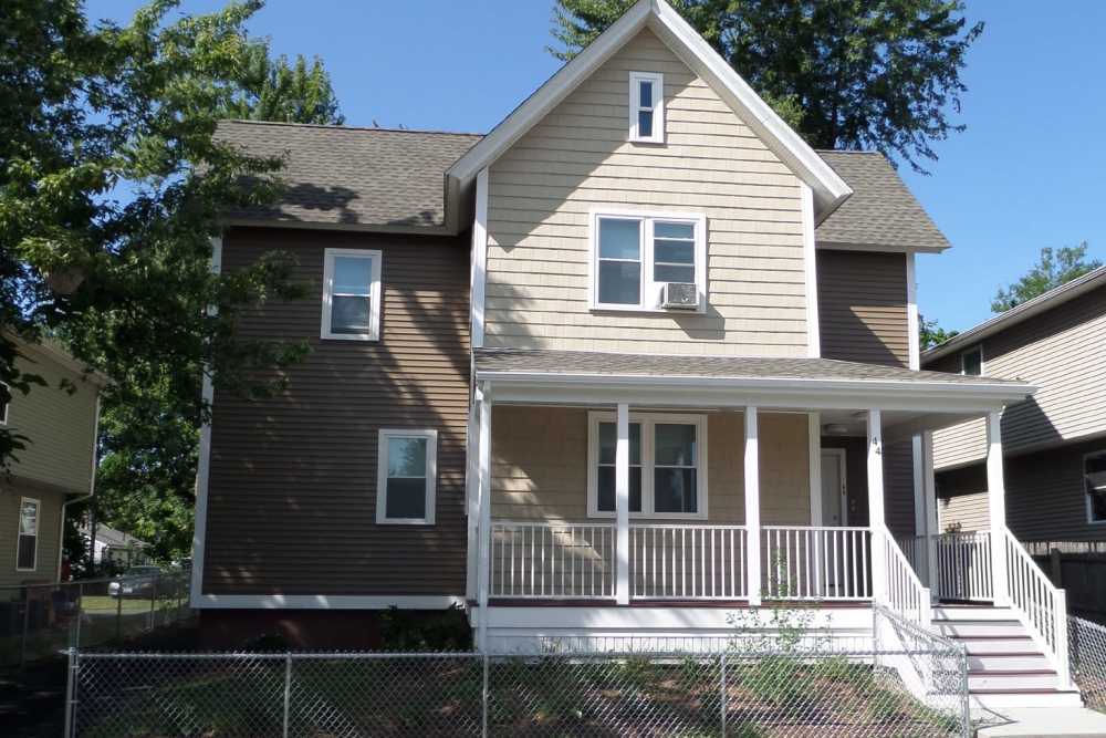 Exterior view of a two-story house at E. Henry Twiggs Estates Phase I in Springfield, Massachusetts