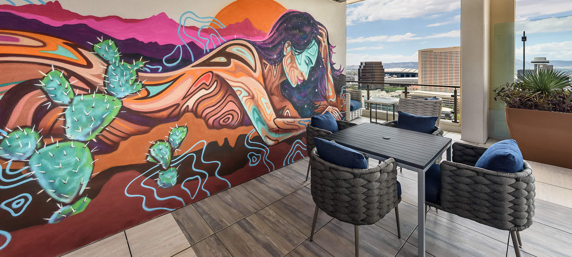 Seating area with mural at Derby in Phoenix, Arizona