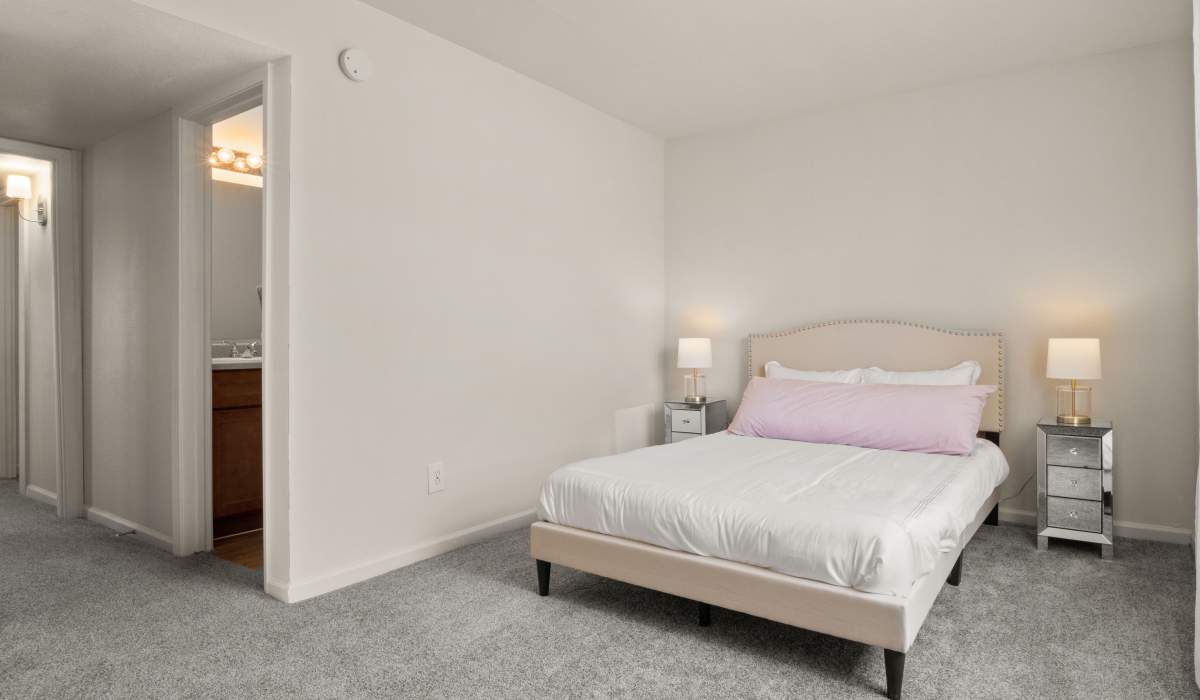 Bedroom with nice lighting at Satsuma Village in Lake Charles, Louisiana
