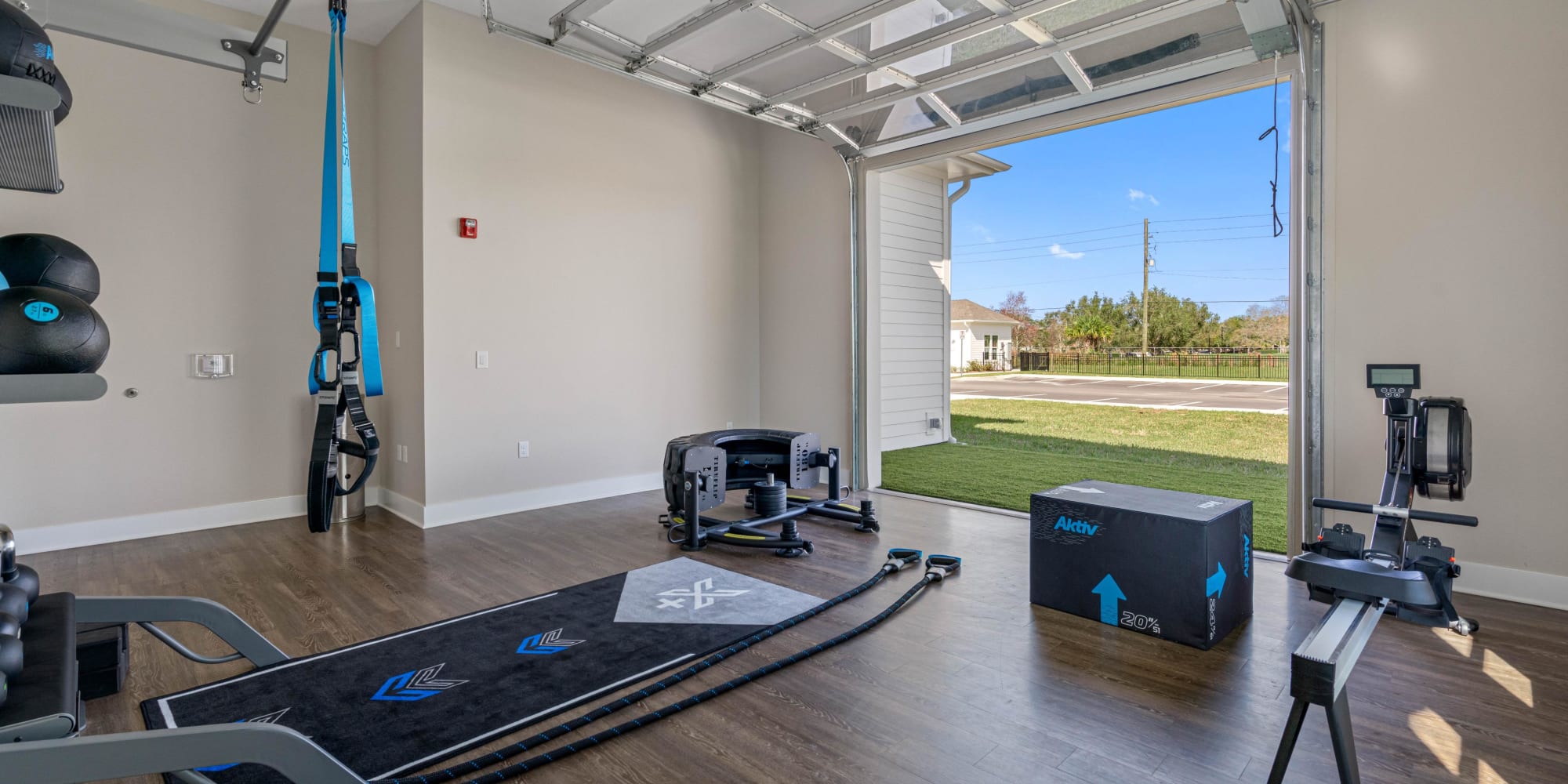 Fitness equipment in the resident gym at The Griffon Vero Beach | Apartments in Vero Beach, Florida