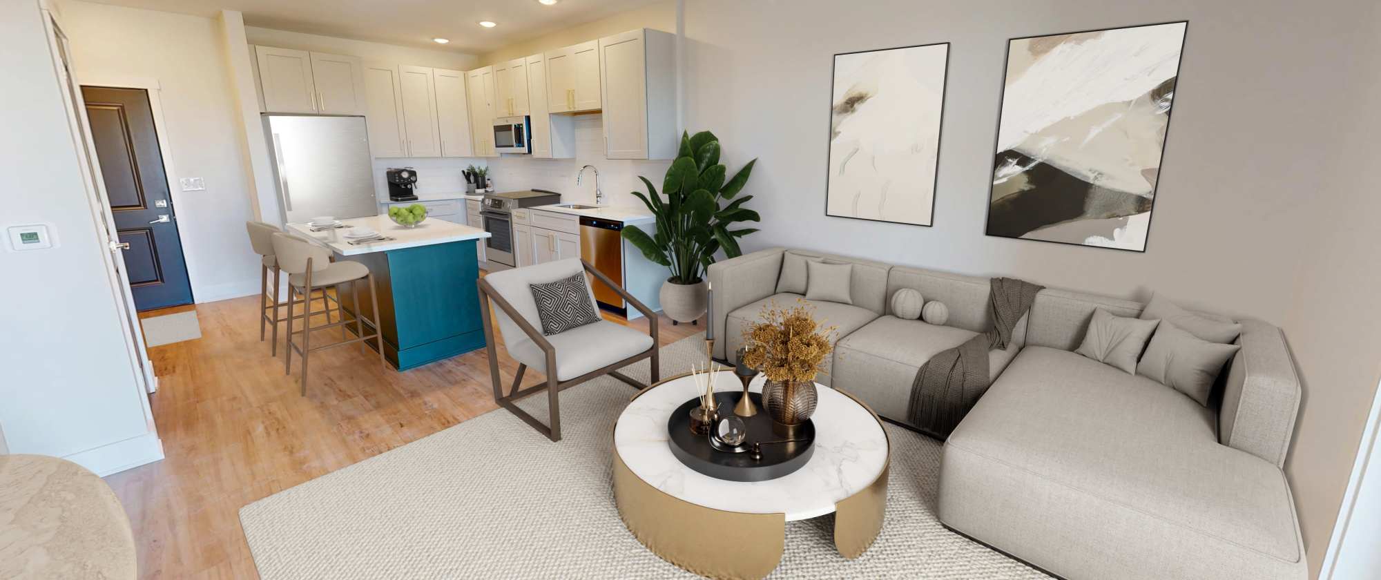 Living room with view of the kitchen with bar seating at Factory 52 Apartments in Norwood, Ohio