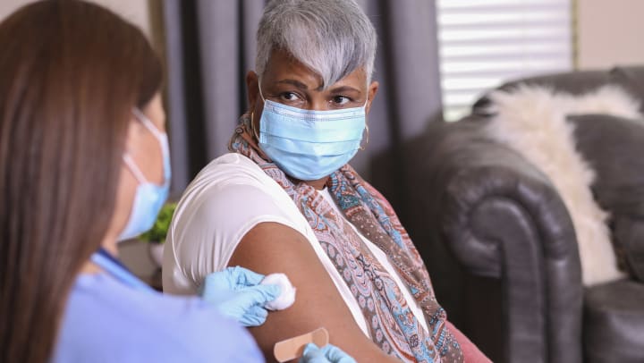 Senior Woman Getting Flu Shot