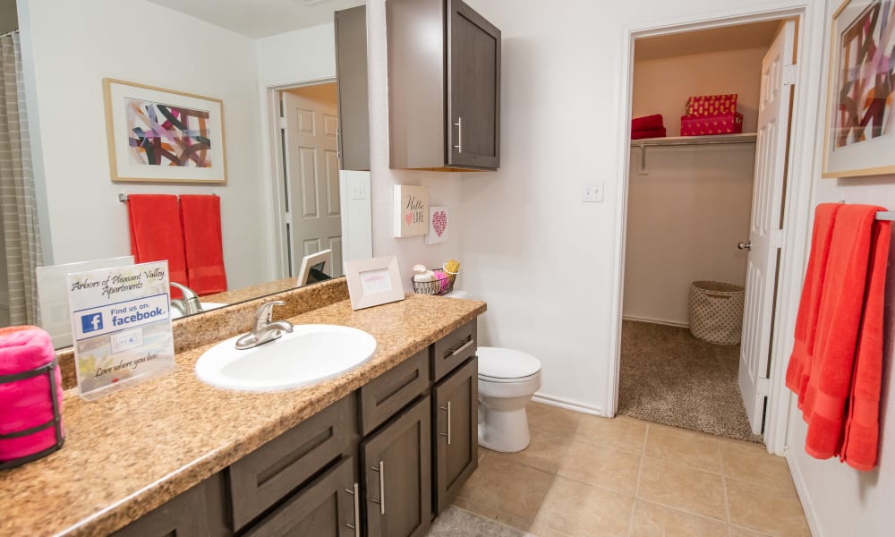 An apartment bathroom at Arbors of Pleasant Valley in Little Rock, Arkansas