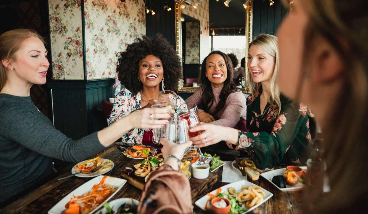 Residents and friends getting together for dinner and drinks at a local eatery near Mirada Apartments in Lewis Center, Ohio