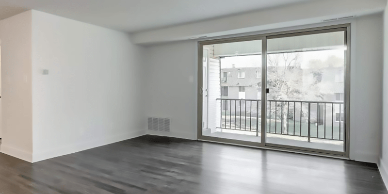 Plank flooring and a balcony in an apartment at Marrion Square Apartments in Pikesville, Maryland