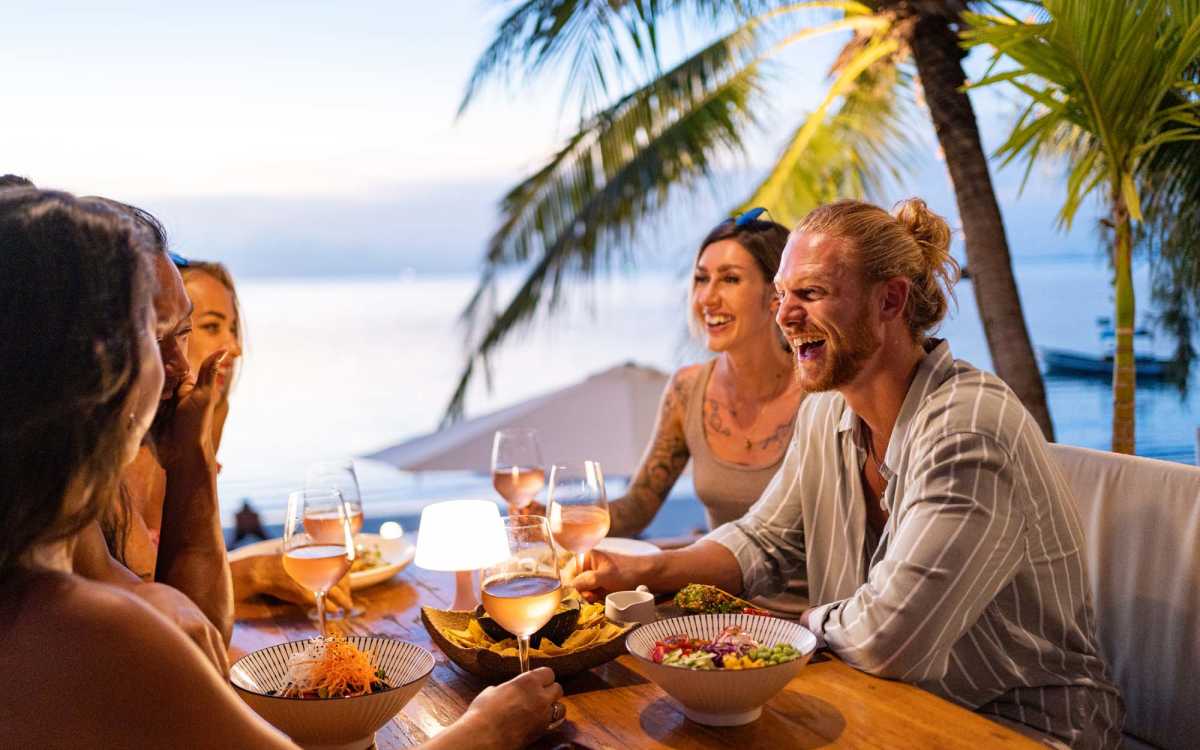 Residents having food ear El Cid Apartments in West Palm Beach, Florida