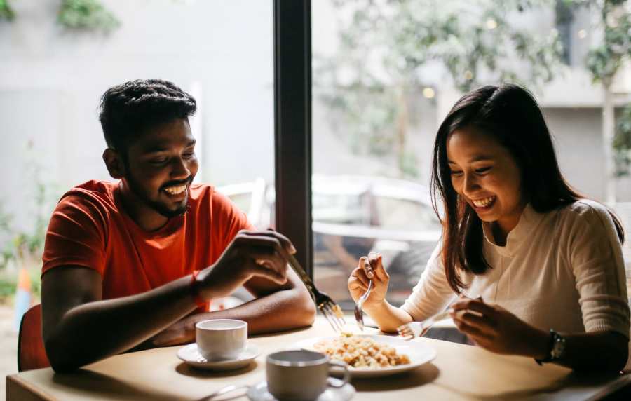 Couple having coffee at a cafe near Amber Court in Fremont, California, 
