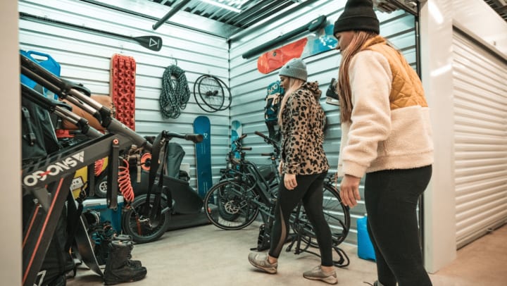 Swapping out winter sporting gear at a StorQuest storage unit