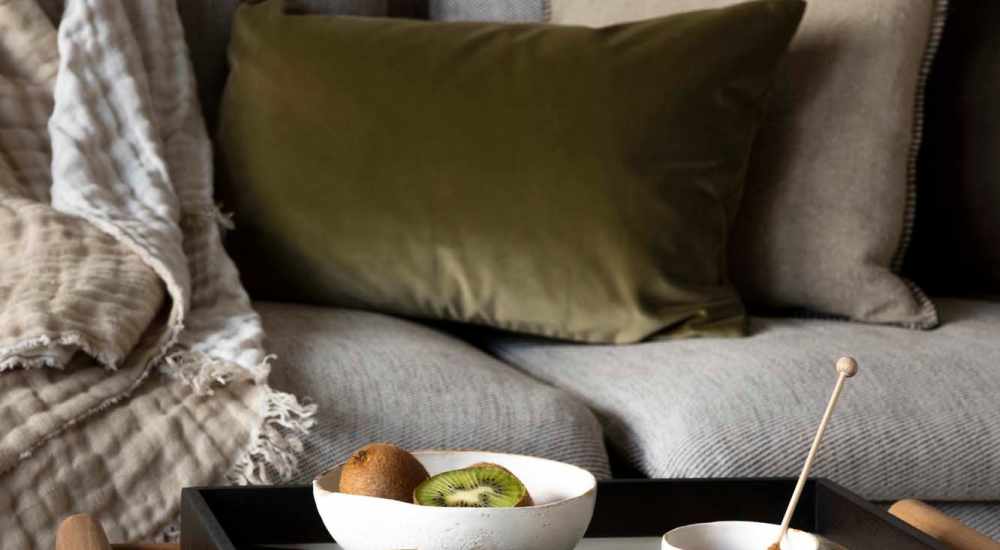 Cozy sofa in a bedroom at Haggerty Lane in Bozeman, Montana