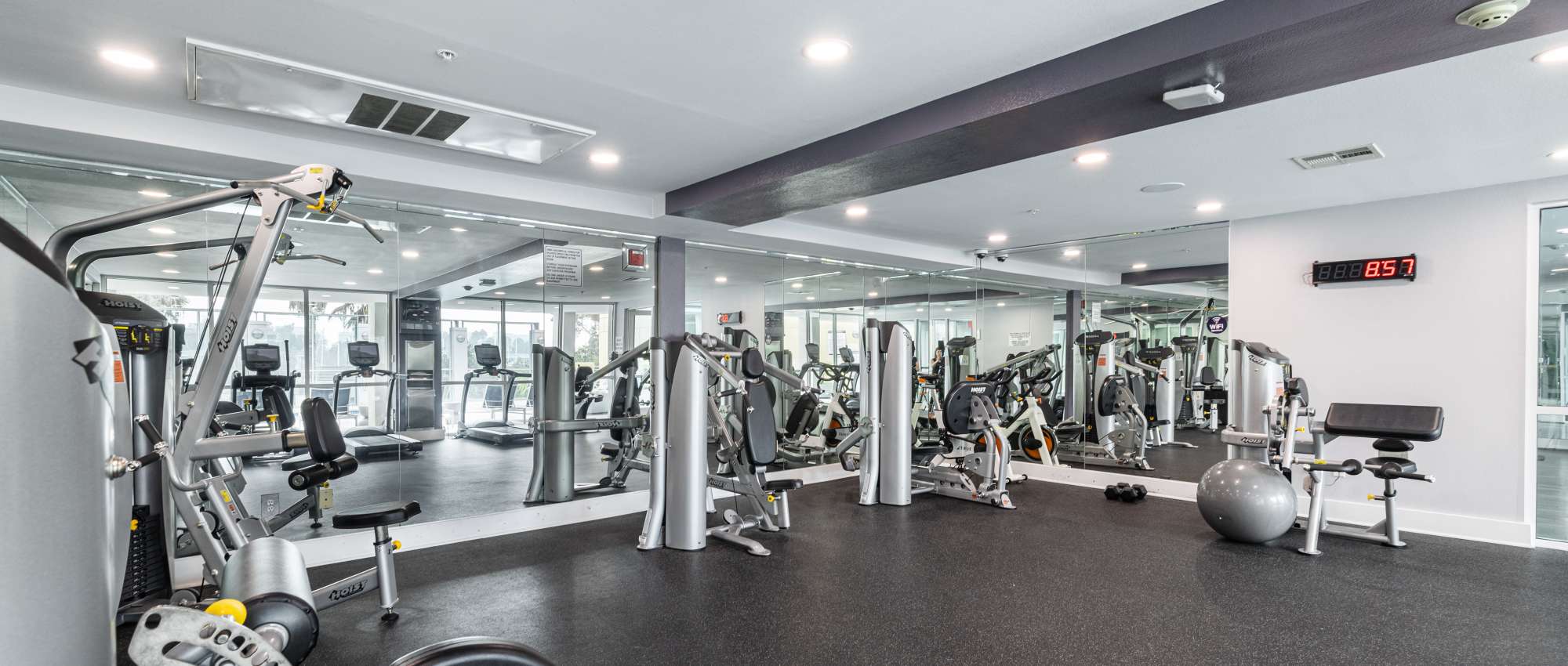 State-of-the-art fitness center with strength training equipment near Capri Apartments in Marina Del Rey, California.