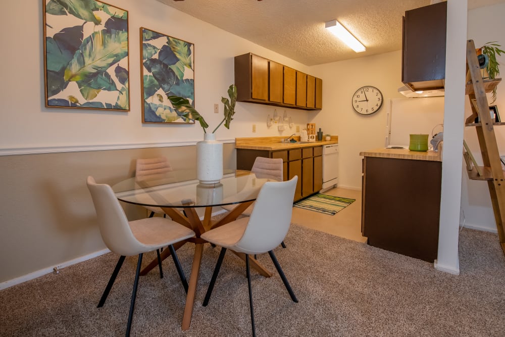 Open dining room and kitchen at Fox Run Apartments in Wichita, Kansas