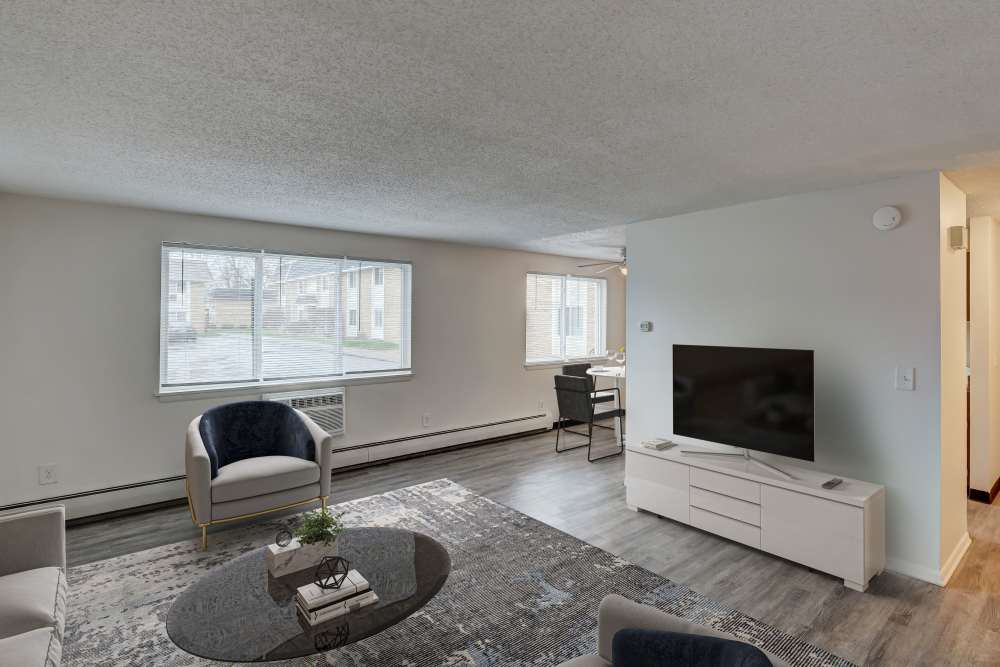 Staged living room with vinyl plank flooring