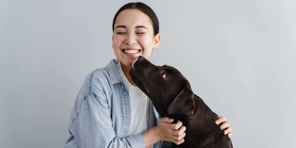 Resident playing with her dog at RainDance in Winter Haven, Florida