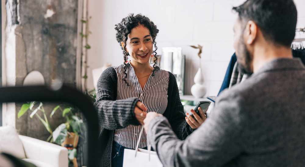 Resident shopping at a clothing boutique near Bluffs at Evergreen in Everett, Washington