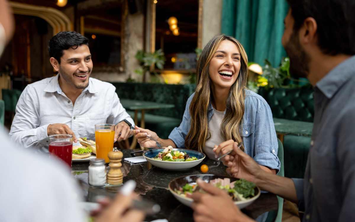Resident friends having lunch at their favorite restaurant near Maplewood Court in Bridgeport, Connecticut