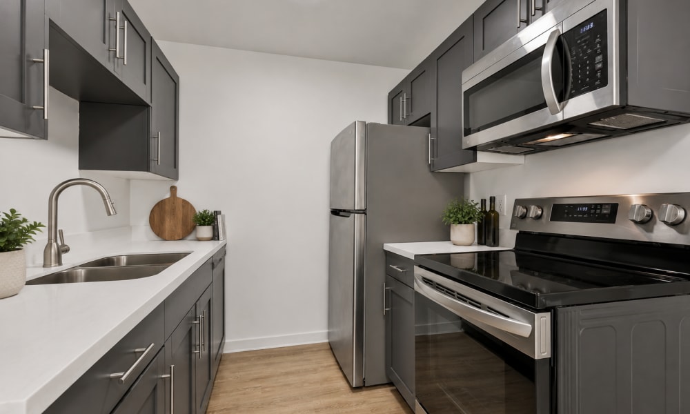 Kitchen with stainless-steel appliances and cabinetry at Shoreview Hills in Shoreview,Minnesota