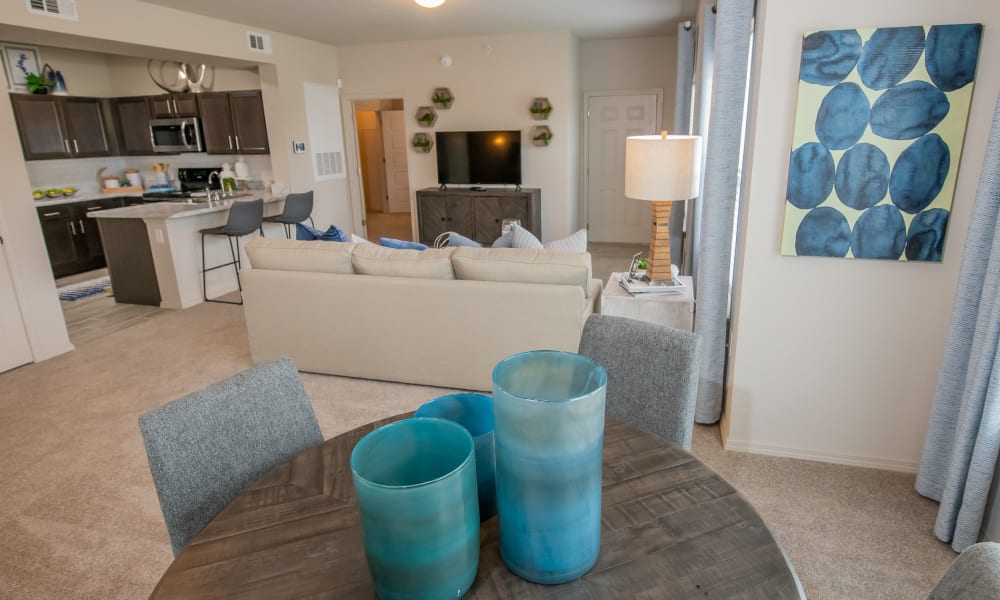 Loft apartment living, dining and kitchen at Bend at New Road Apartments in Waco, Texas