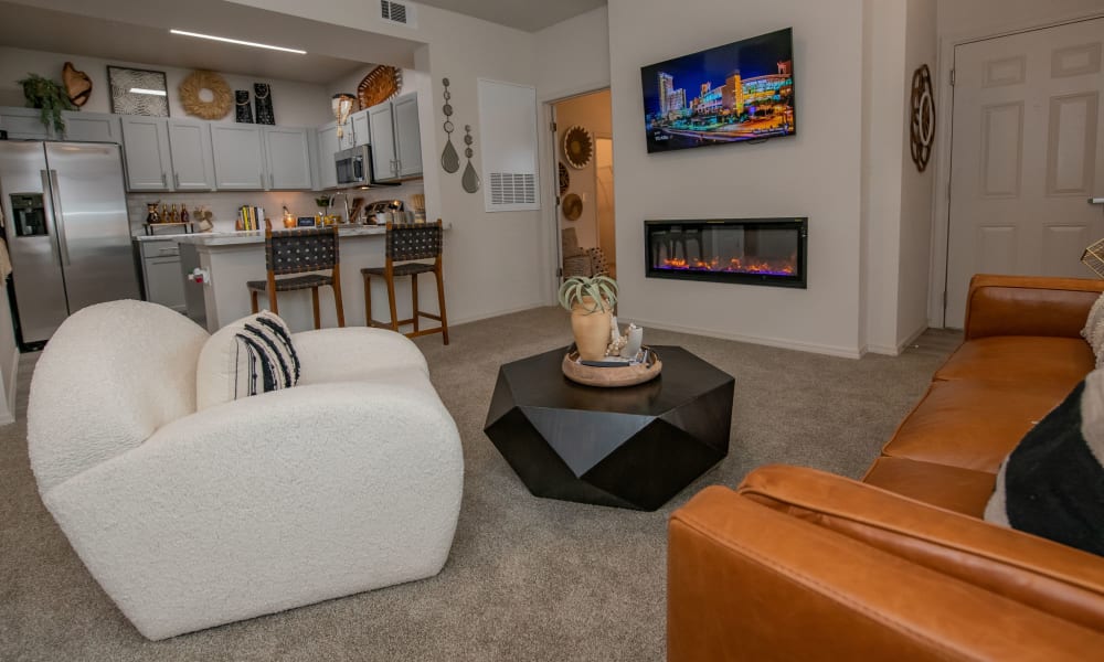 Model living room with open floor plan at Redbud Ranch Apartments in Broken Arrow, Oklahoma