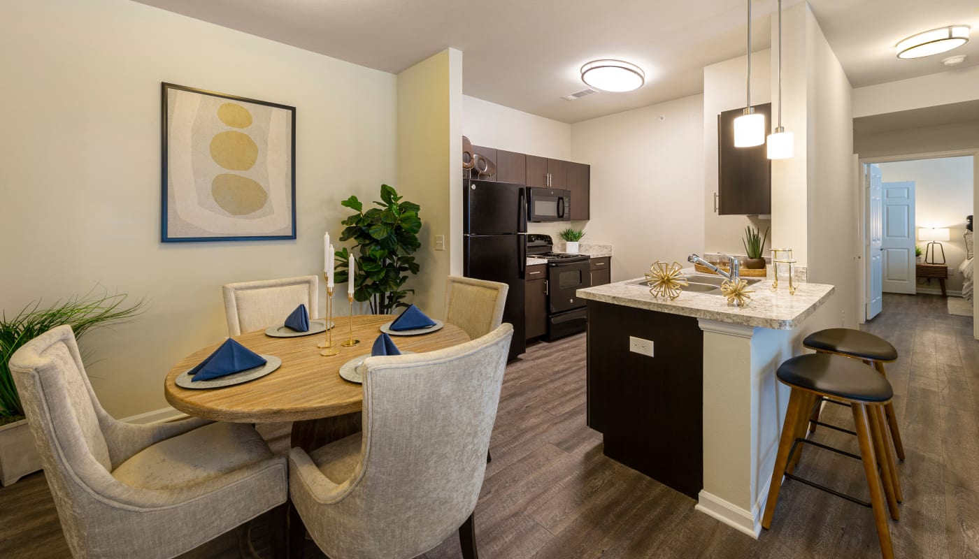 Model apartment dining room at Brazos Crossing in Richwood, Texas