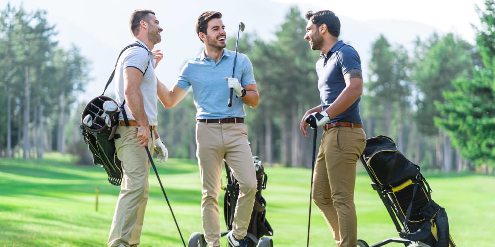 Residents chatting at a golf course near Tides on Palm in Las Vegas, Nevada