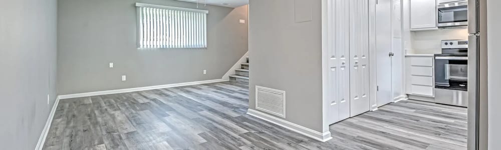 Spacious living room with an open kitchen at Woodside Village in Valparaiso, Indiana