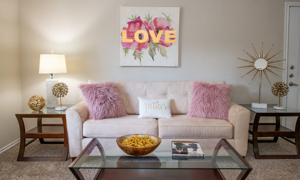An apartment living room at Arbors of Pleasant Valley in Little Rock, Arkansas