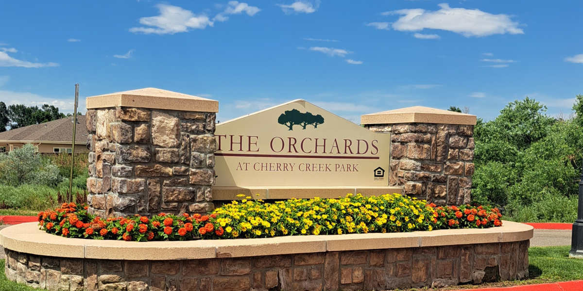 Apartment building exterior at The Orchards at Cherry Creek Park in Centennial, Colorado