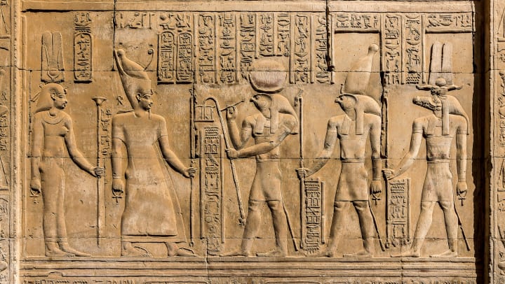 Relief sculptures of Egyptian hieroglyphs.