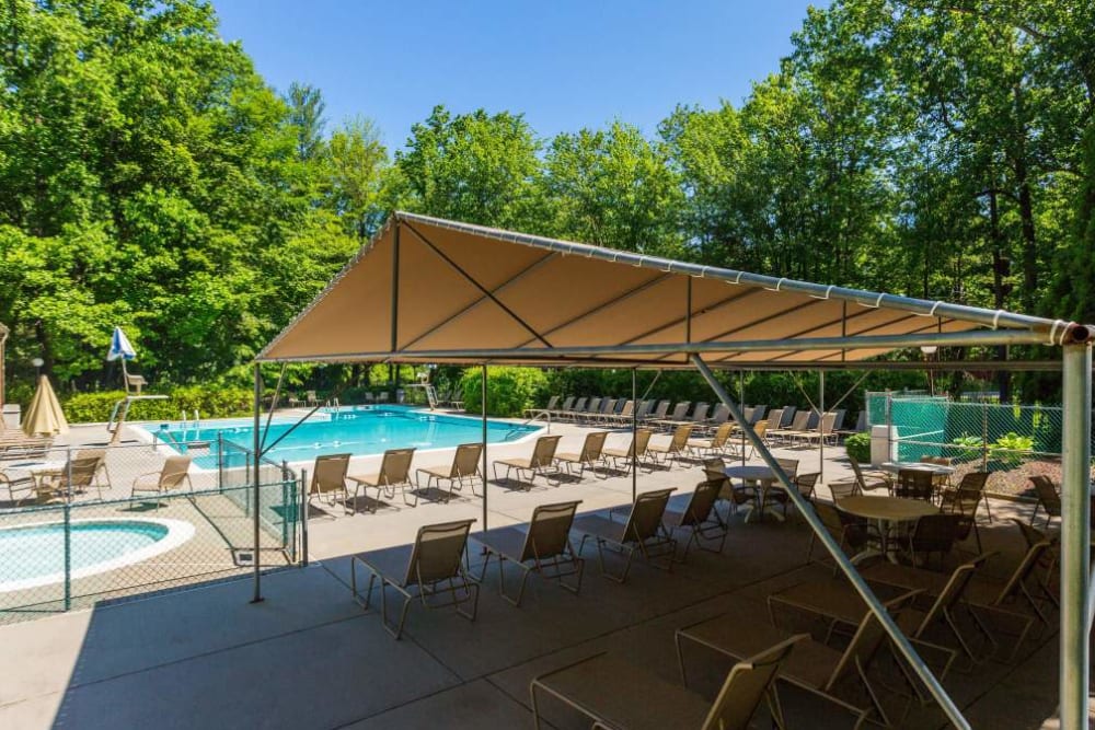 Swimming pool and patio at Annen Woods Apartments in Pikesville, Maryland