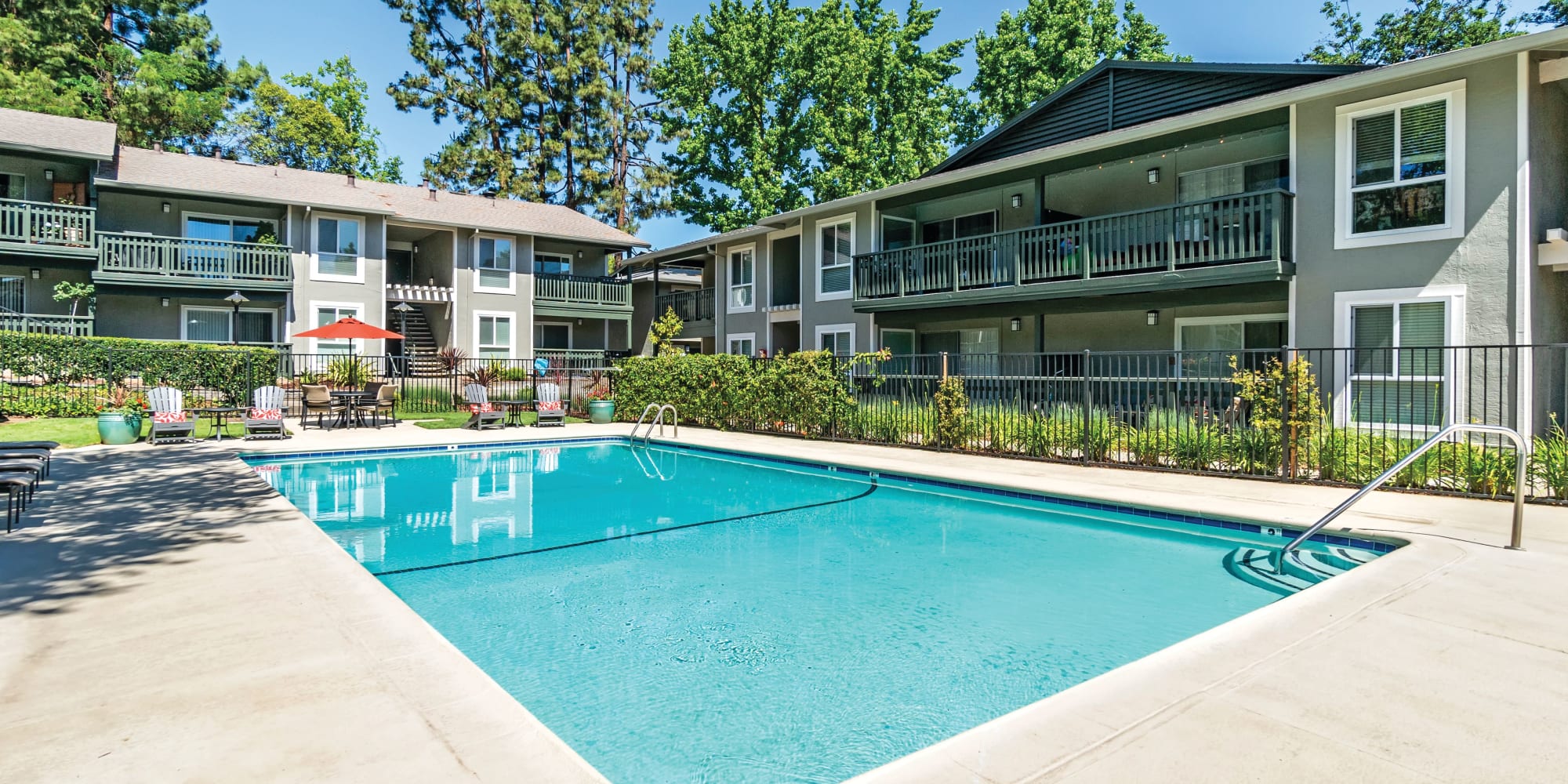 Enjoy a swimming pool at Pleasanton Glen Apartment Homes in Pleasanton, CA