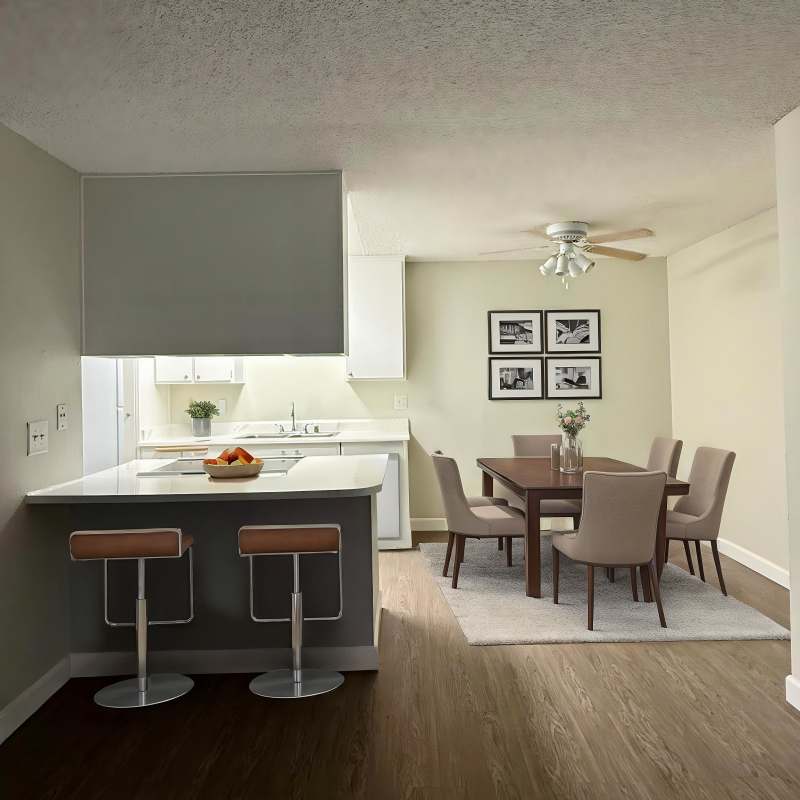 Kitchen with electric cooktop at Gramercy Apartments in San Diego, California