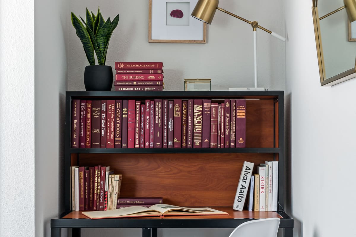 Desk with a bookshelf in a model bedroom at The Kristi in Corpus Christi, Texas