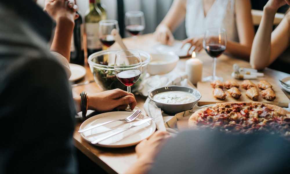 Residents having a feast together at Burnett Place Apartments in Taylor, Texas