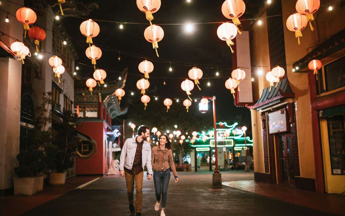 Residents walking in night with lights near Stratford Point in Sanford, Florida
