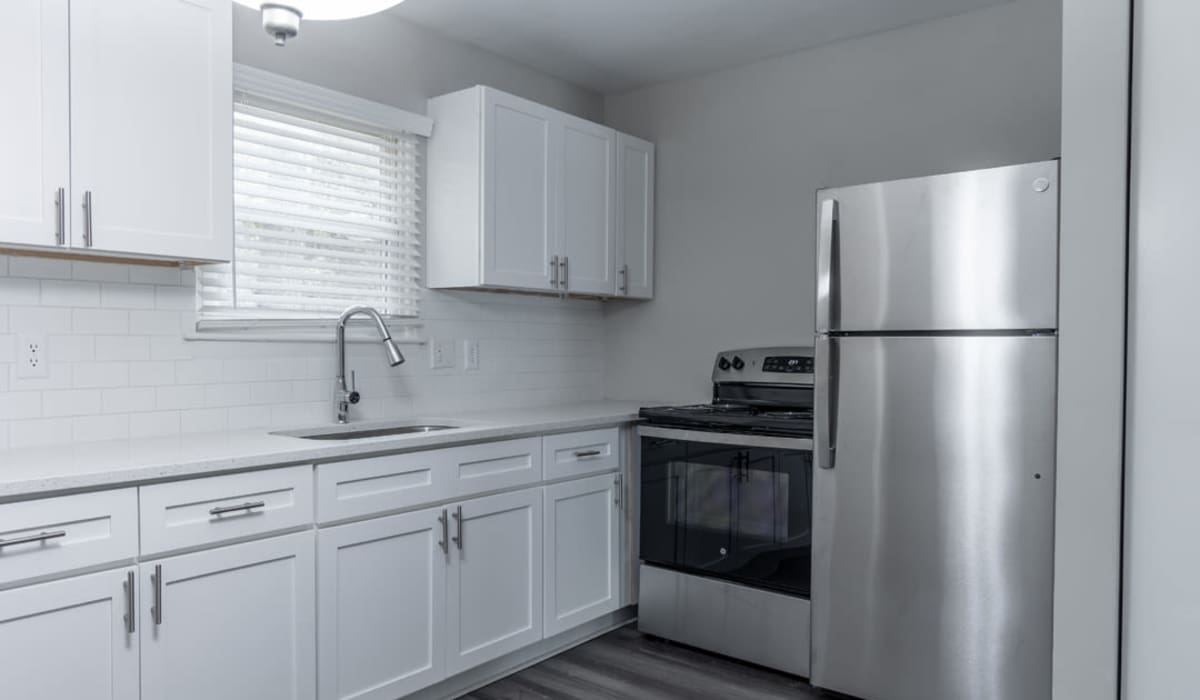 Modern kitchen with stainless-steel appliances at Forest Ridge in Richmond, Virginia