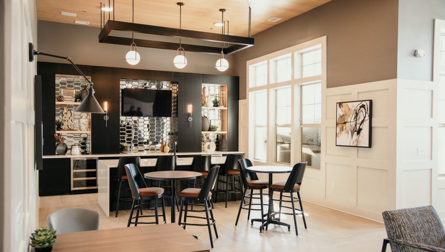 Club room kitchen and dining area at The 450 in Lombard, Illinois